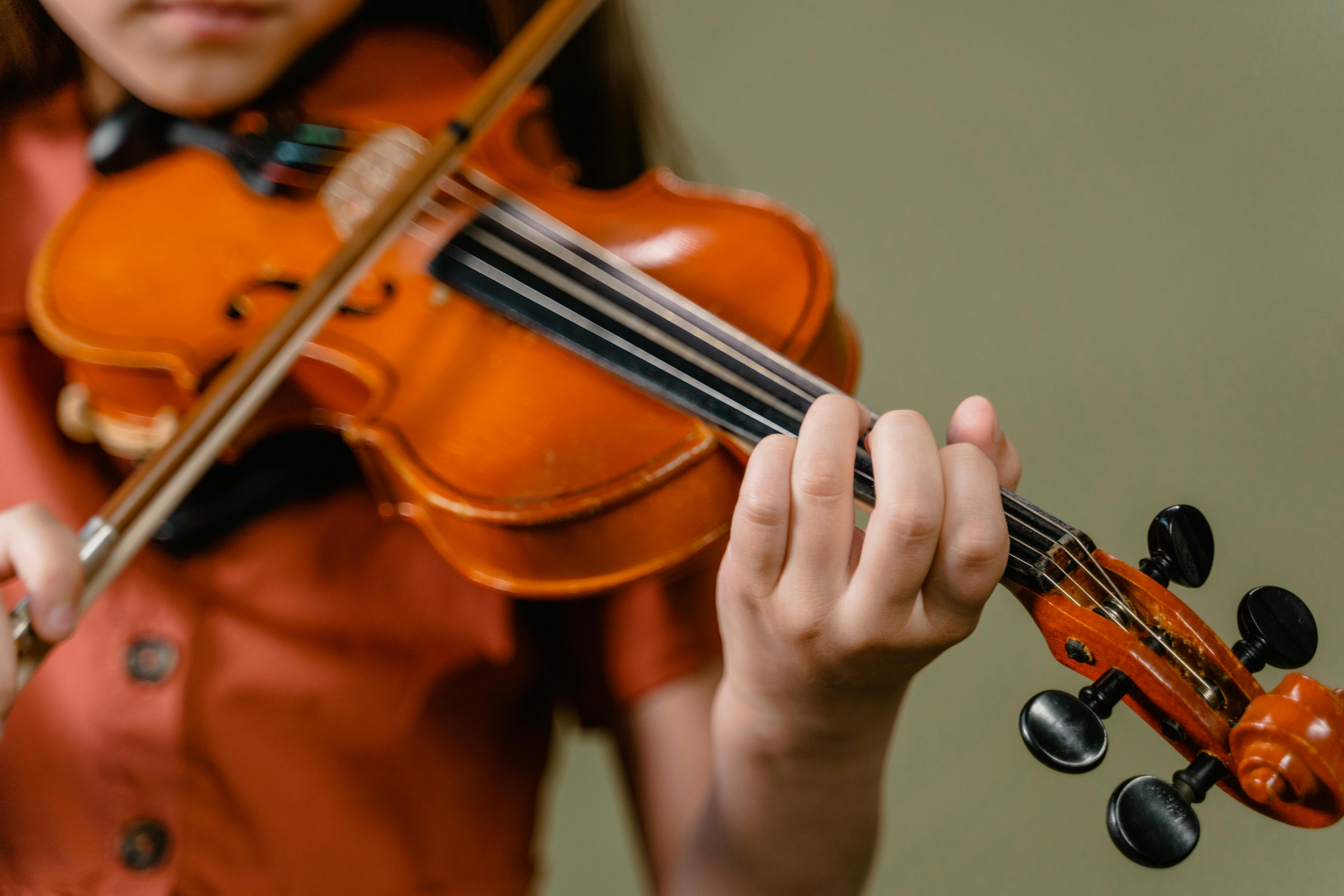 student playing violin